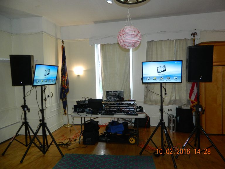 portable dj booth with 2 speakers and monitors